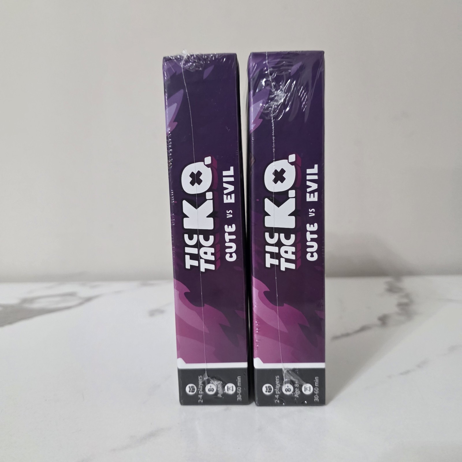 Tic Tac K.O. Cute vs. Evil 2 Card Game 8+ K.O. 2-4 Players Unstable Games