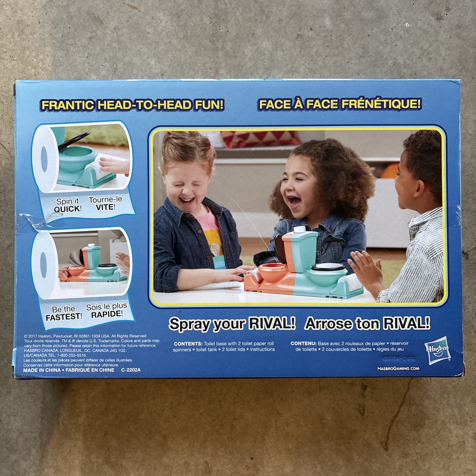 Hasbro Gaming Toilet Trouble Flushdown Kids Game Water Spray Ages 4+ ES. V