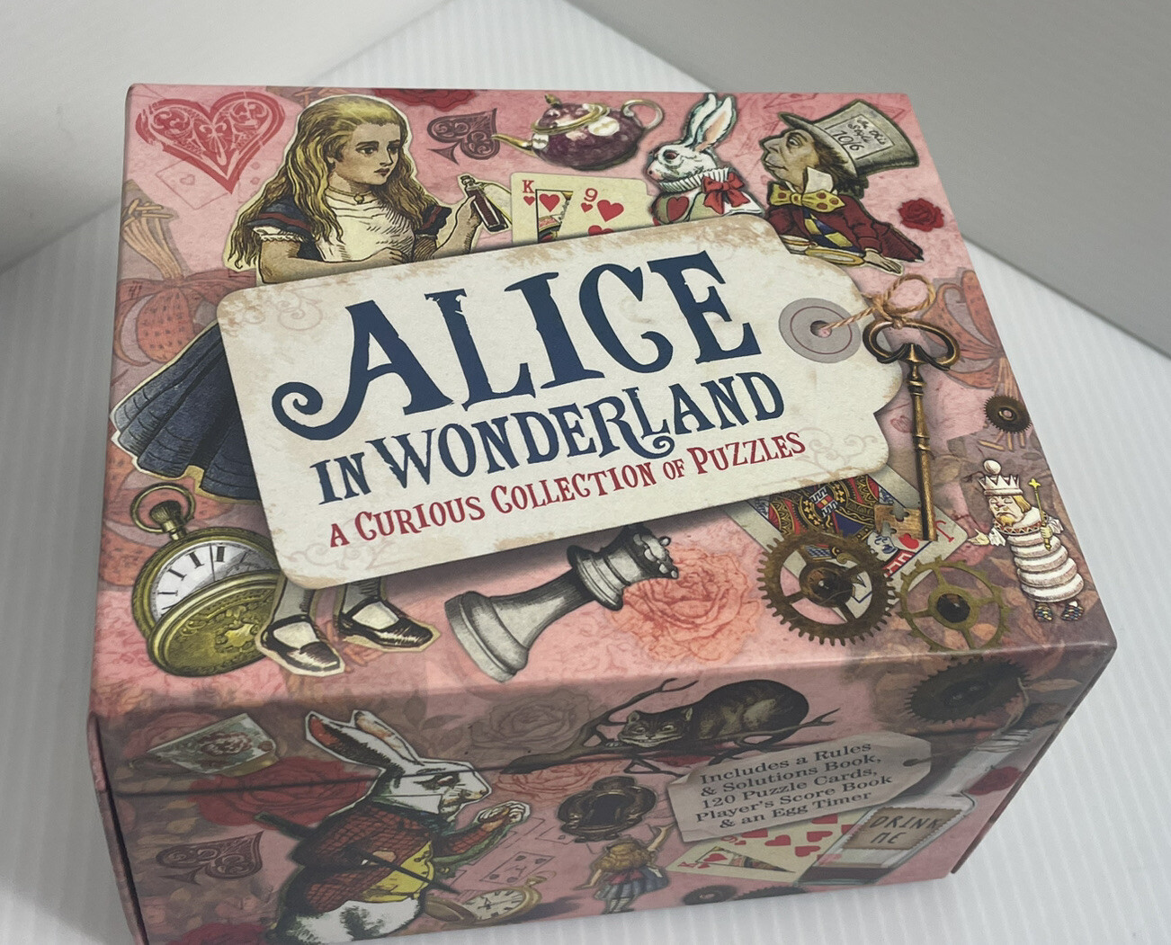 Sterling Innovation Alice in Wonderland Collection of Puzzles Trivia Game Open