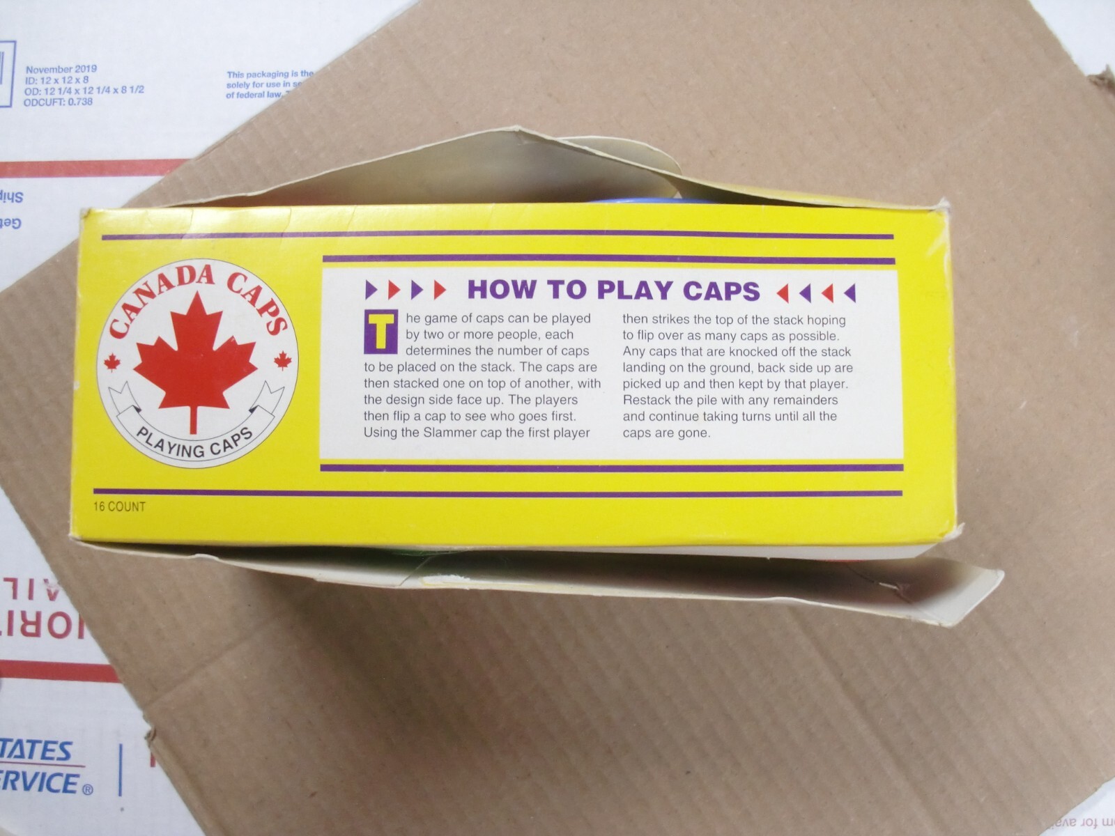 POGS/MILKCAPS CANADA CAPS STARTER KITS BOX WITH 16 STARTER POG KITS IN CANISTERS
