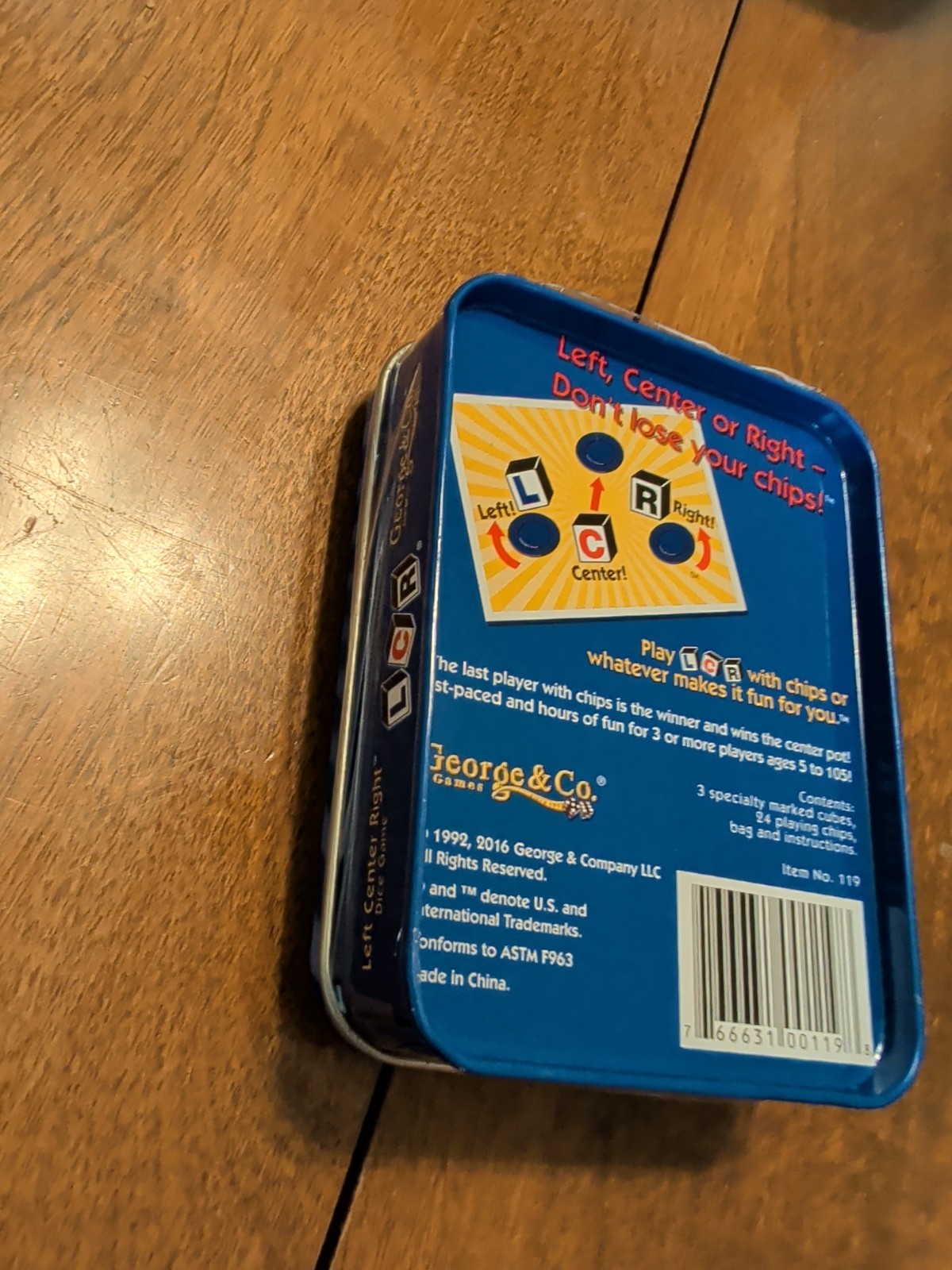 LCR® Left Center Right™ Dice Game – Blue Tin