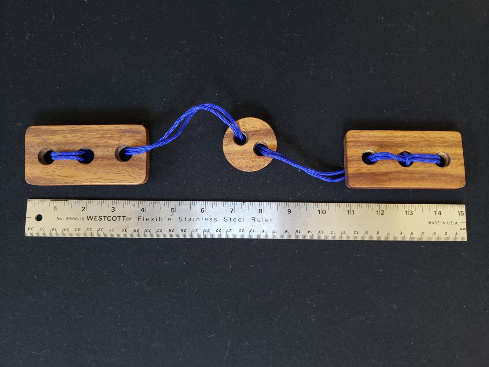 Victoria String Puzzle, made from Monkey Pod Wood from Thailand