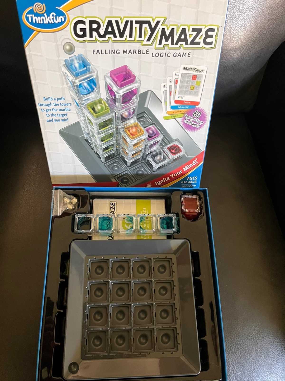 THINK FUN GRAVITY MAZE GAME FALLING MARBLE AGES 8 TO ADULT ignite your mind!