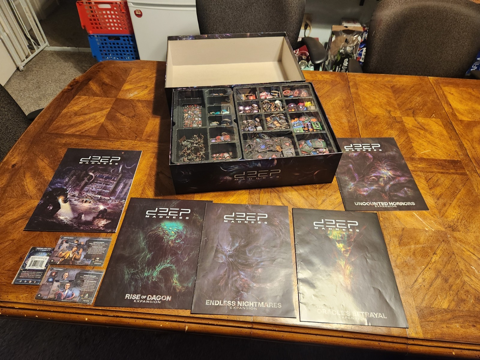 Deep Madness, 5 expansions, 2 miniature packs Profundum and Monstrum boxes
