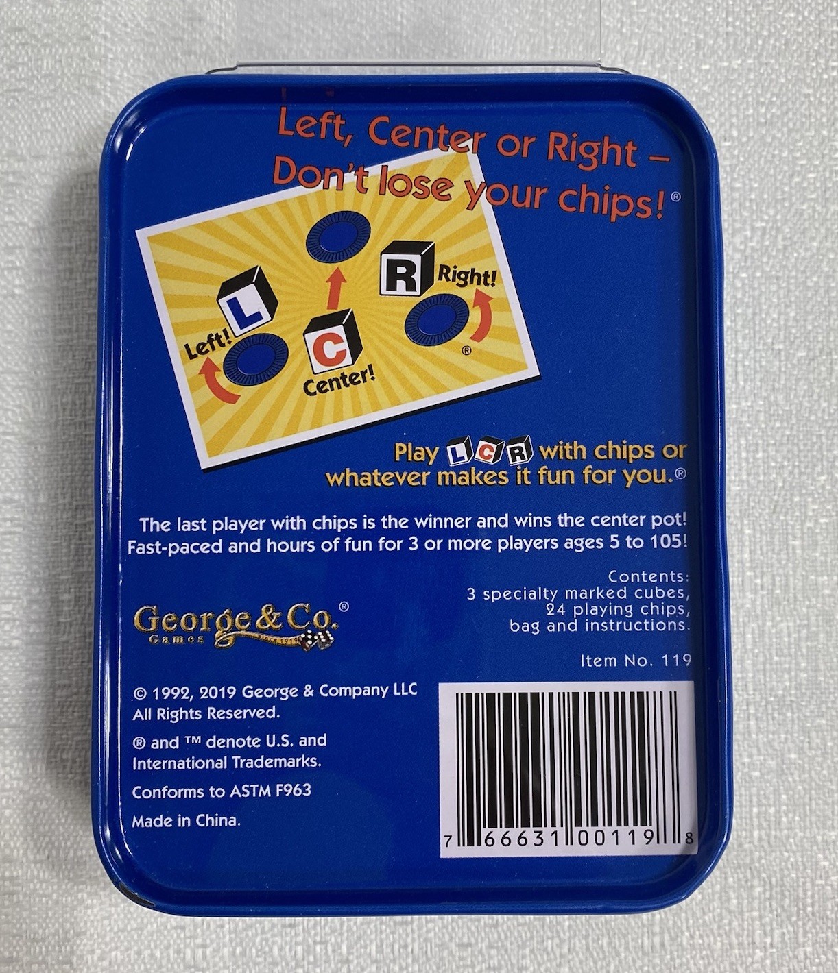 LCR® Left Center Right™ Dice Game – Blue Tin