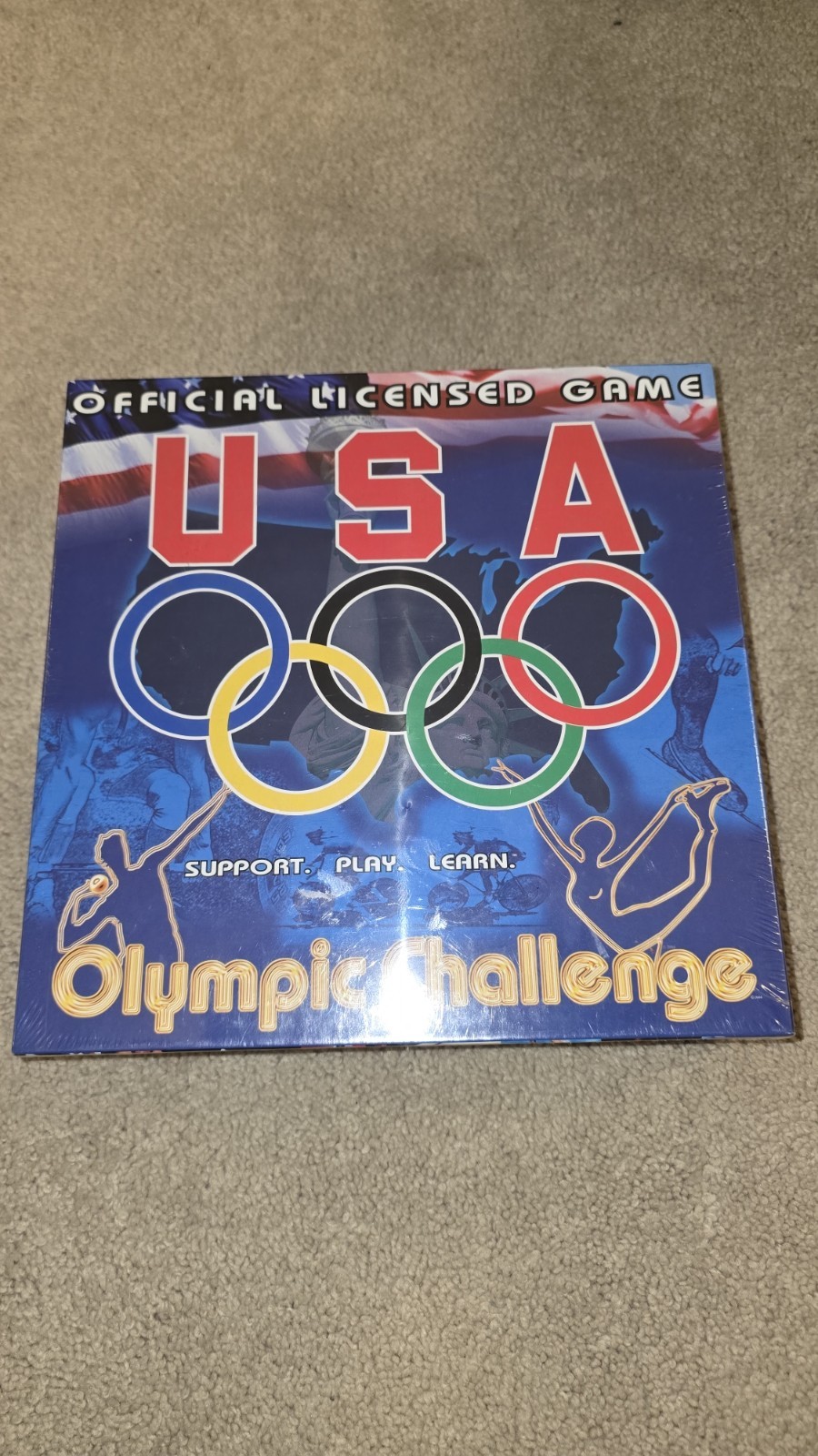 Factory-sealed copy of the USA Olympic Challenge trivia board game.