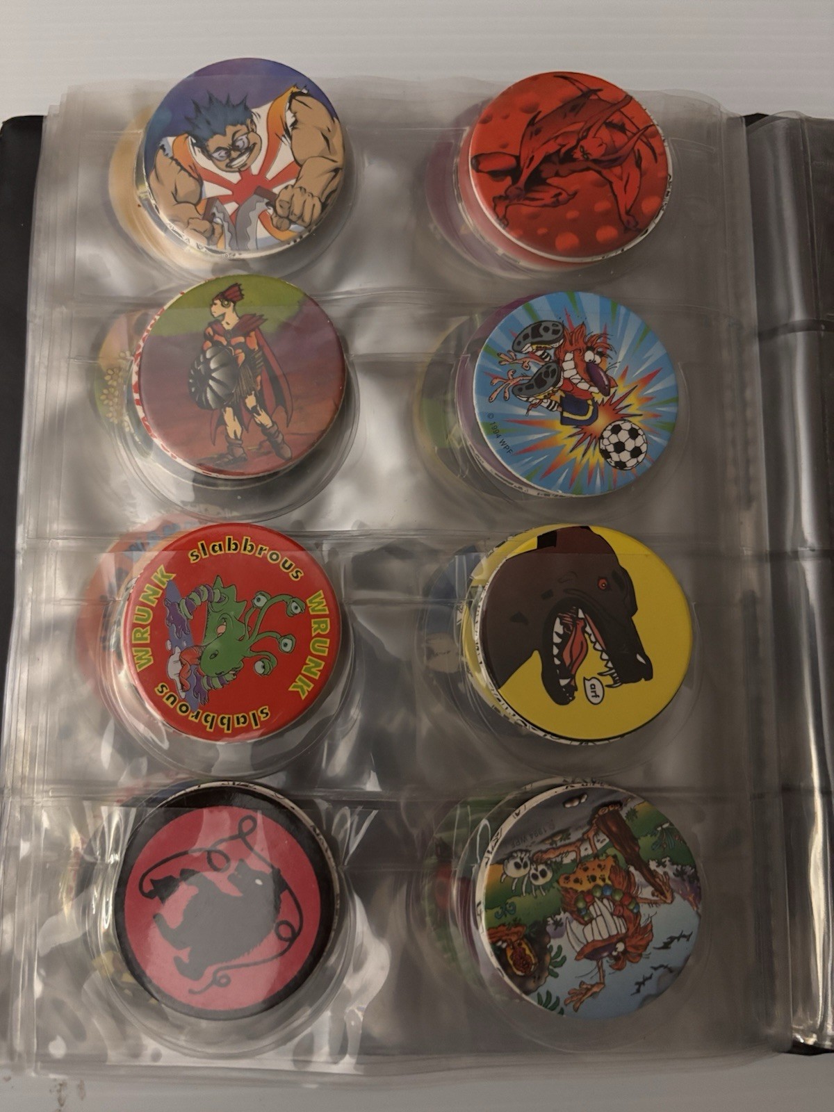 8 Page Pog Cap Album With 118 Pogs