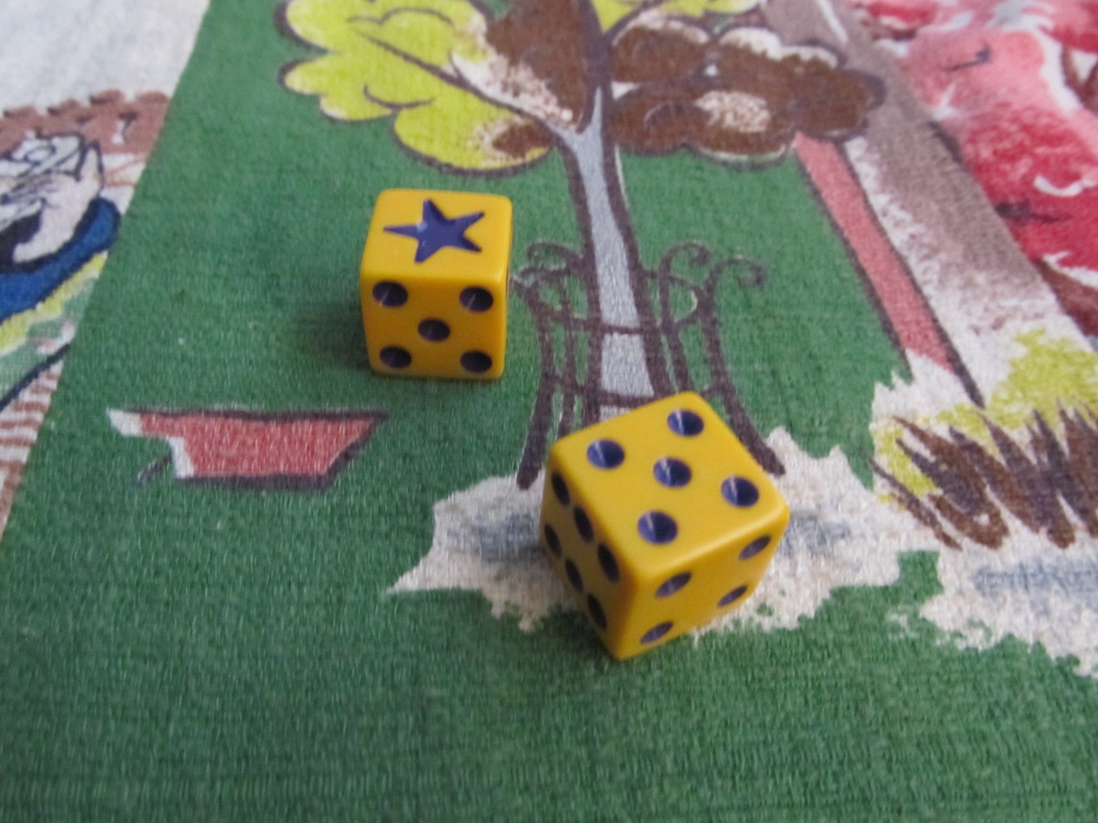 Vintage pair of yellow with purple Liar’s Dice
