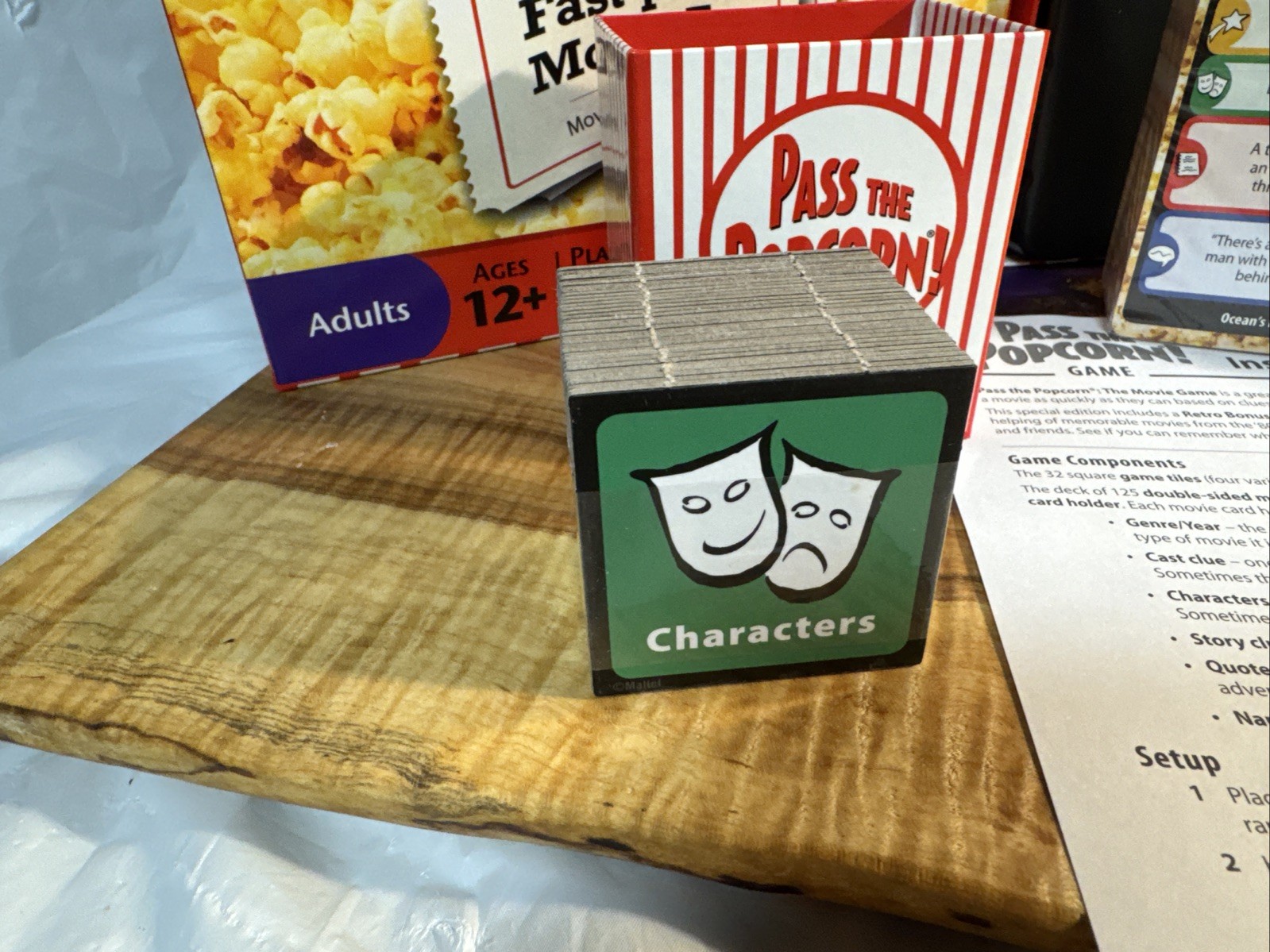 Pass the Popcorn Trivia game. New and complete . Open box.