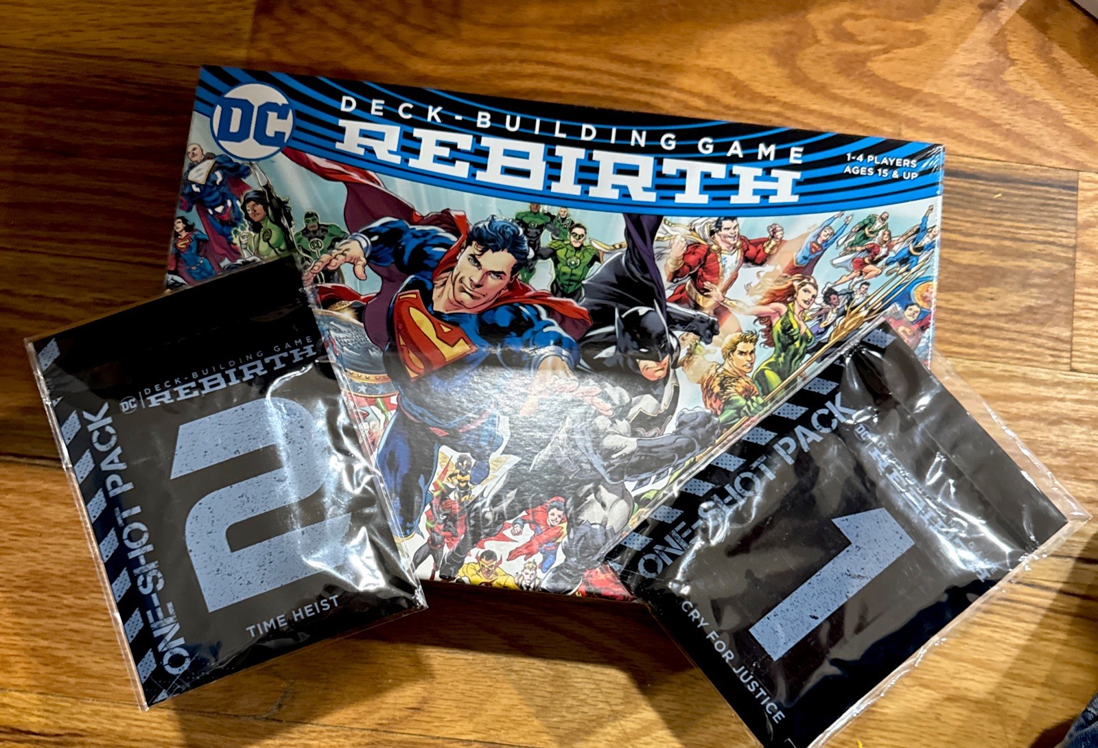 2019 DC Comics Deck-Building Game REBIRTH also includes one shot packs 1 and 2