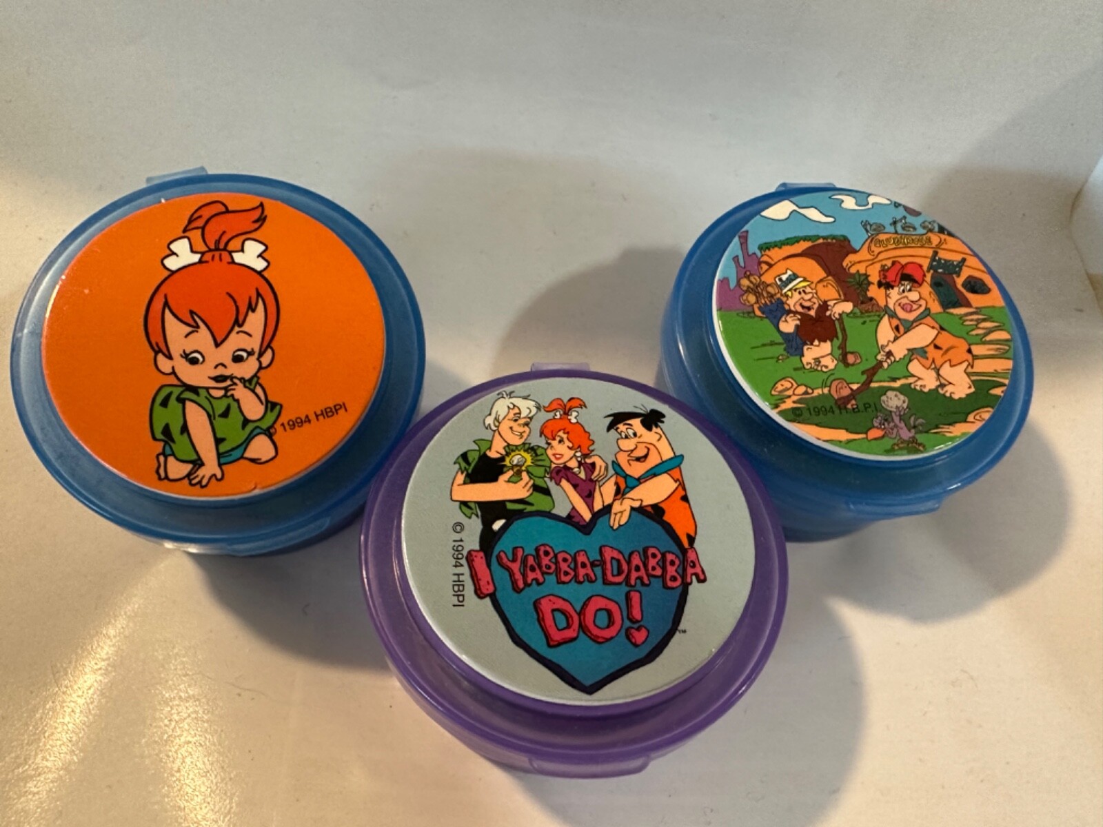 Flintstones Pogs ONE container, with 5 pogs and one plastic slammer RANDOM