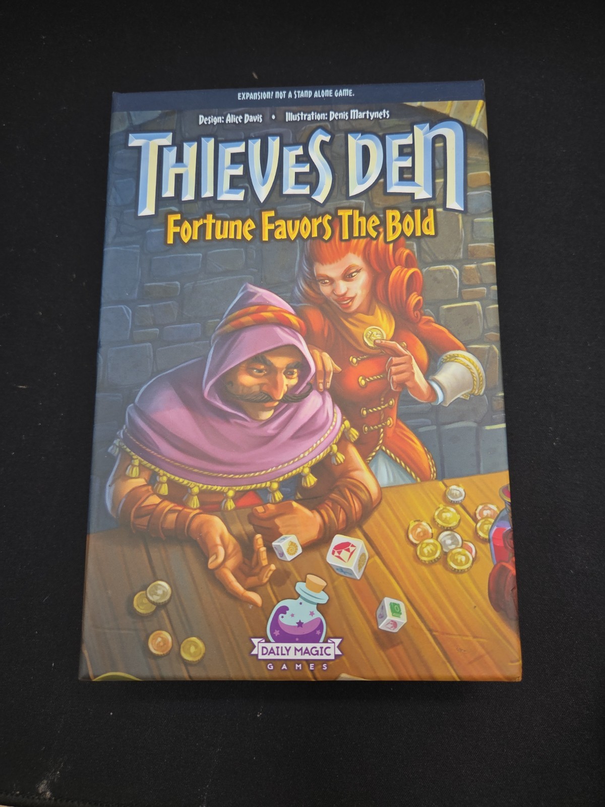 Daily Magi Boardgame Thieves Den – Fortune Favors the Bold Expans Box SW (New)