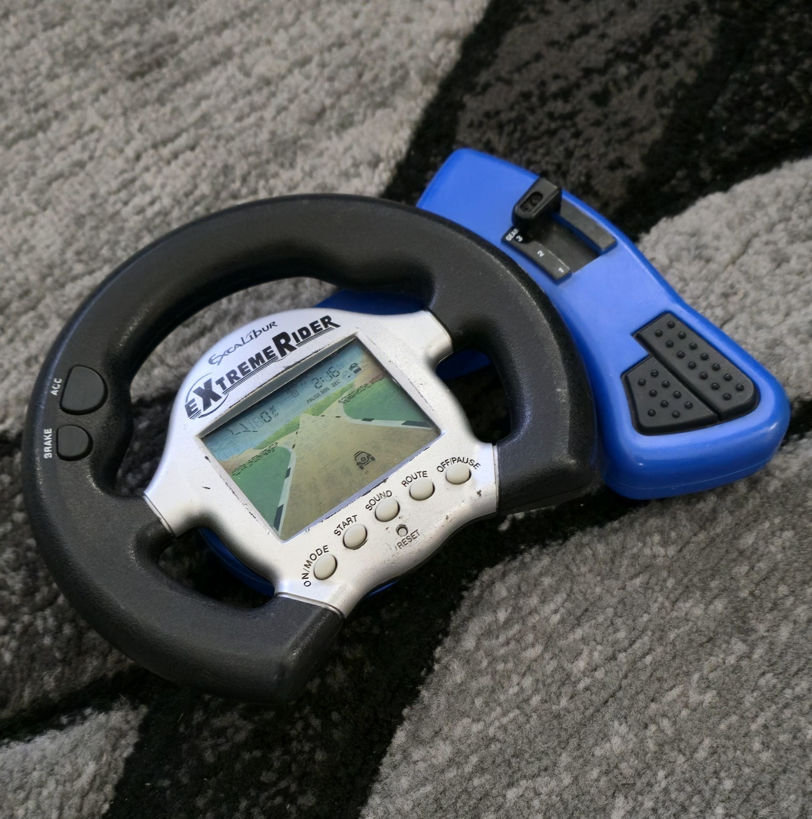EXCALIBUR Extreme Rider Electronic Handheld Travel Game