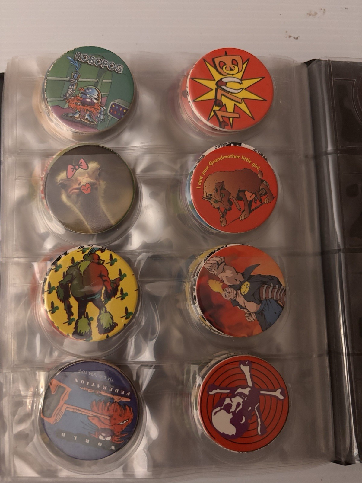 8 Page Pog Cap Album With 118 Pogs