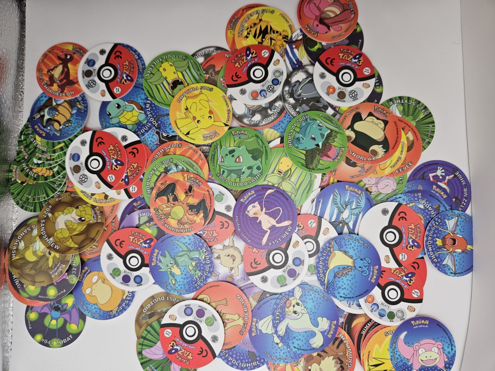 Lot of 500 Random Mix Of 2002 Pokemon Tazos From 1st Generation Pokemon Tazos