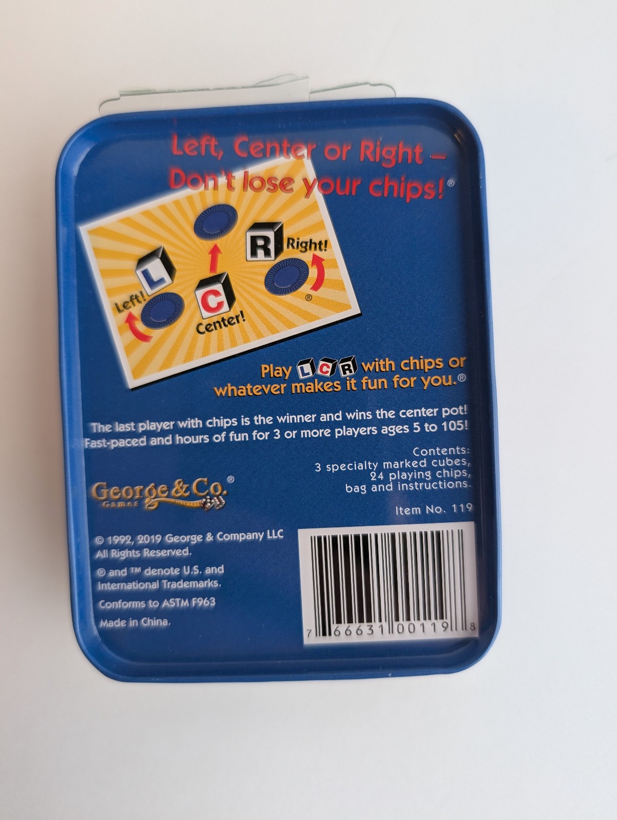 LCR® Left Center Right™ Dice Game – Blue Tin