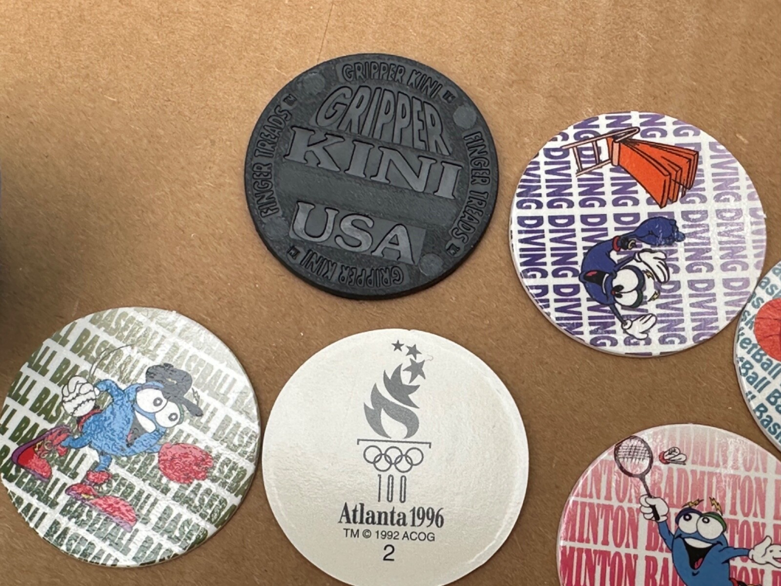 Olympics Pogs Vintage 1996 with Kini Slammers Izzy Atlanta, One Random Container