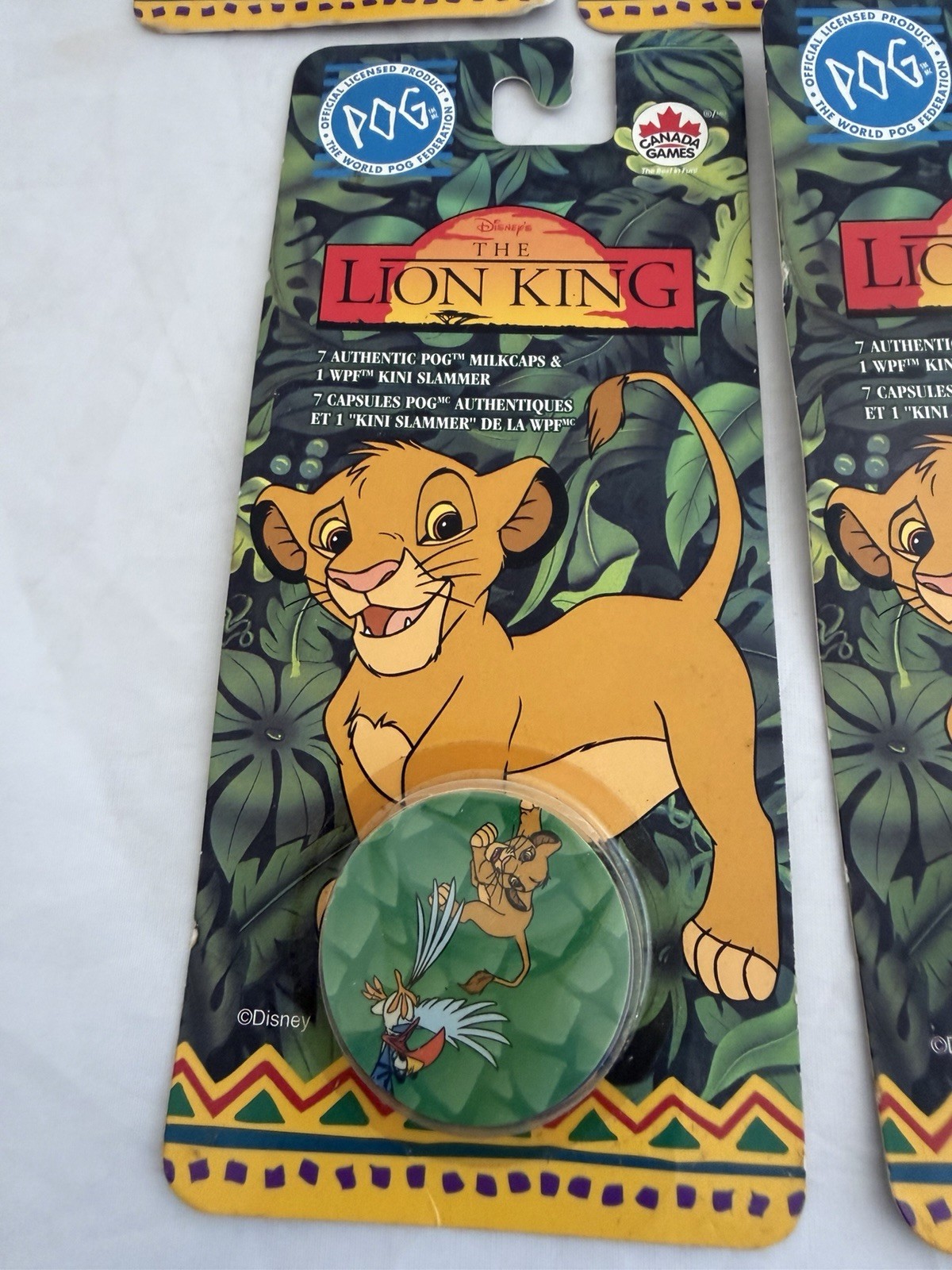 The World Pog Federation Lot of 7 The Lion King Carded Pogs with Slammer New