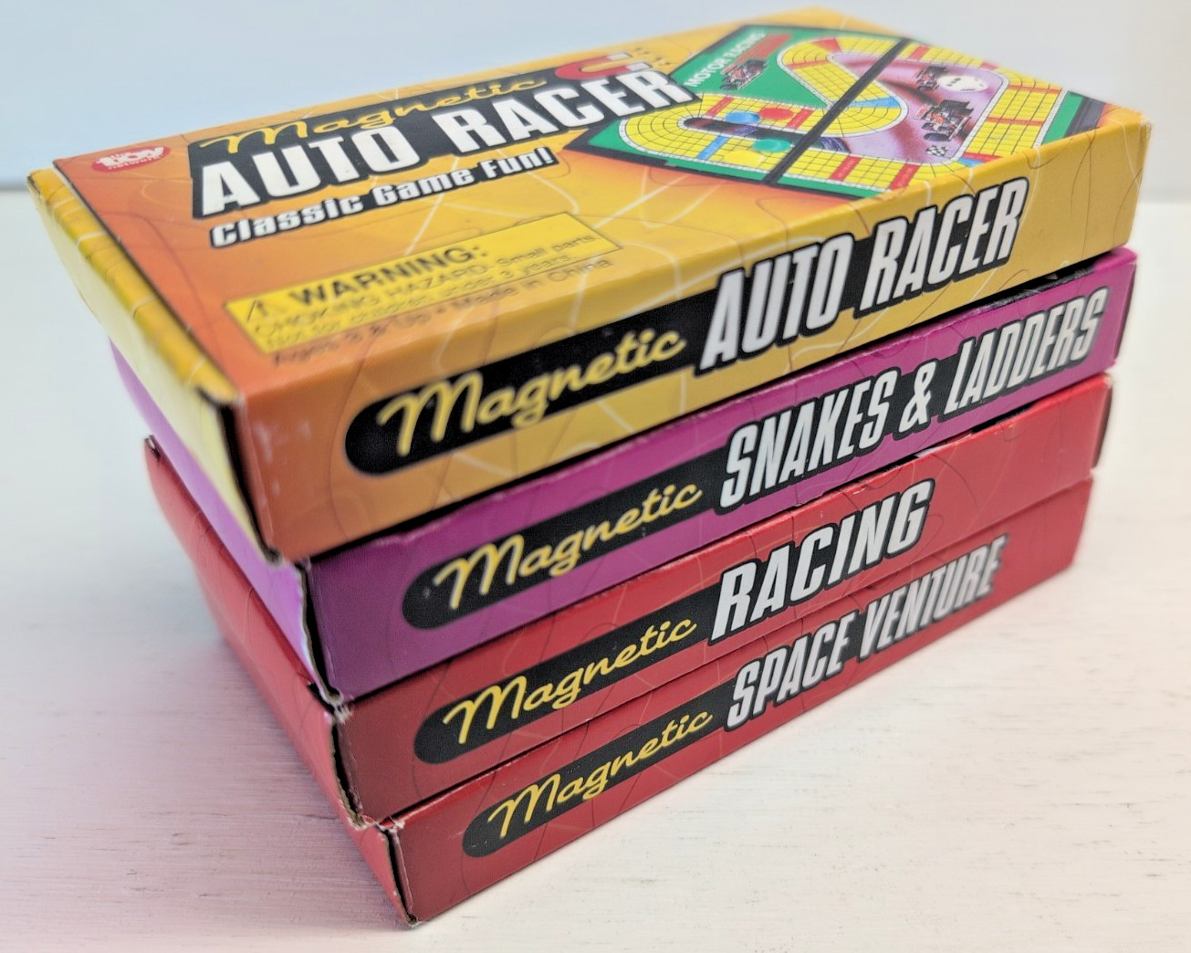 NEW! SET OF 4 TOY NETWORK MAGNETIC TRAVEL GAME SNAKES & LADDERS RACING SPACE