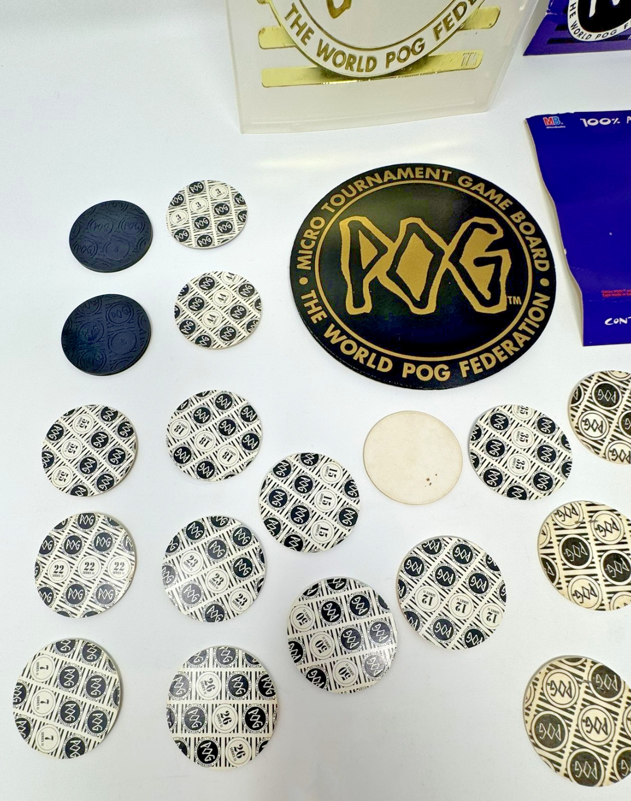 The World POG Federation Micro Tournament Game Pack with 2 Slammers & 25 Pogs