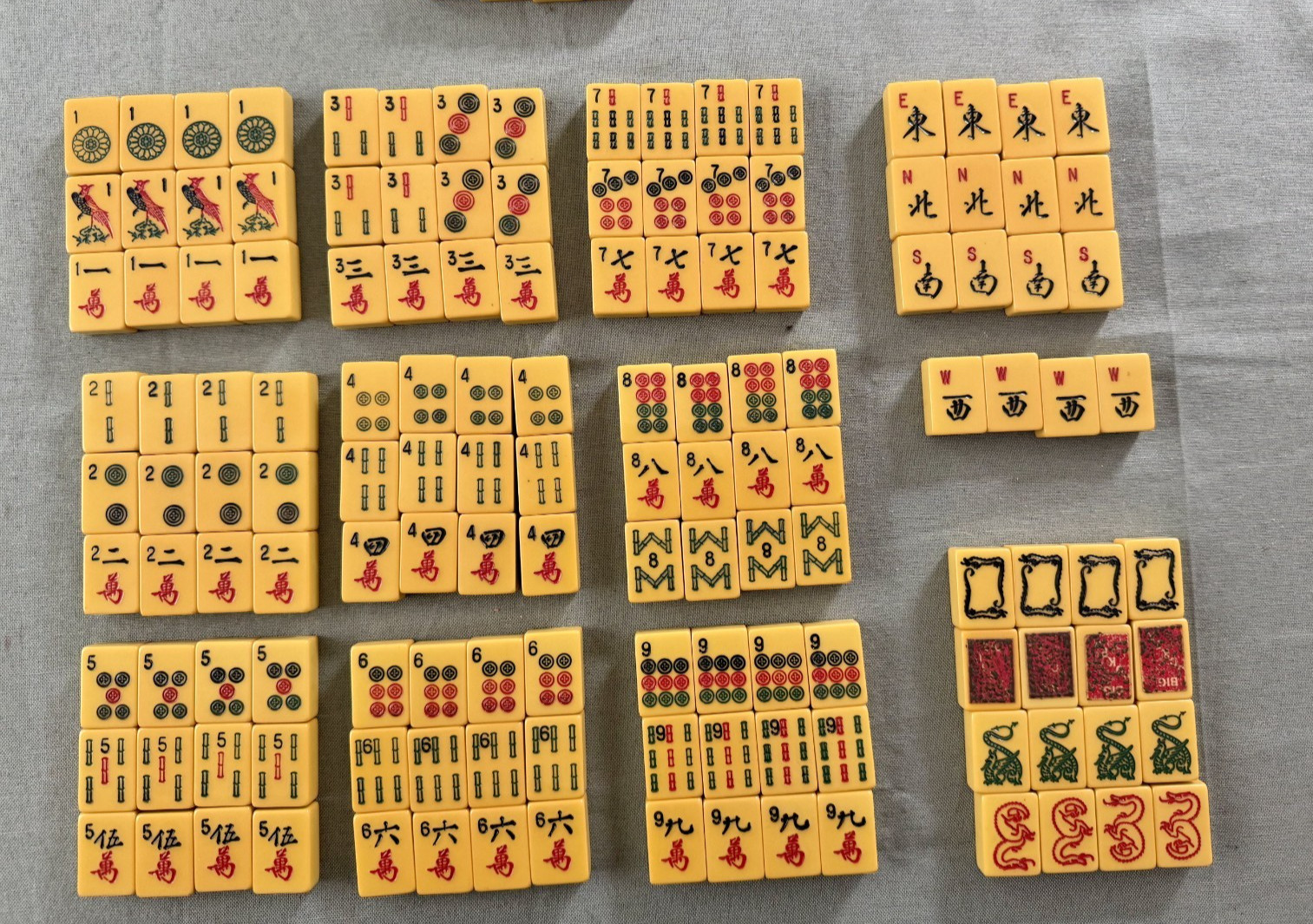 Vintage Mahjong Set Butterscotch Bakelite Tiles & 4 Multicolor Racks