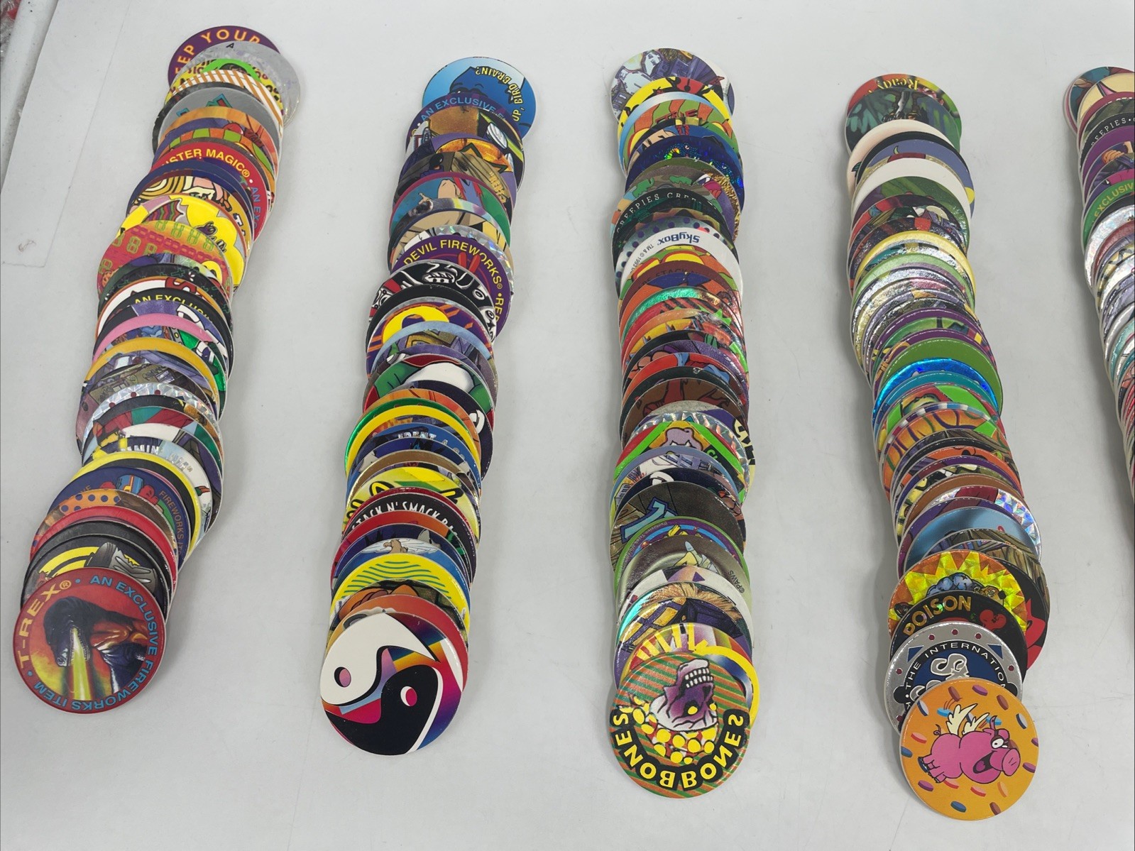 Large POGS Lot (825+ Milk Caps, 130+ Slammers, 10 Game Pads, 13 Tubes)