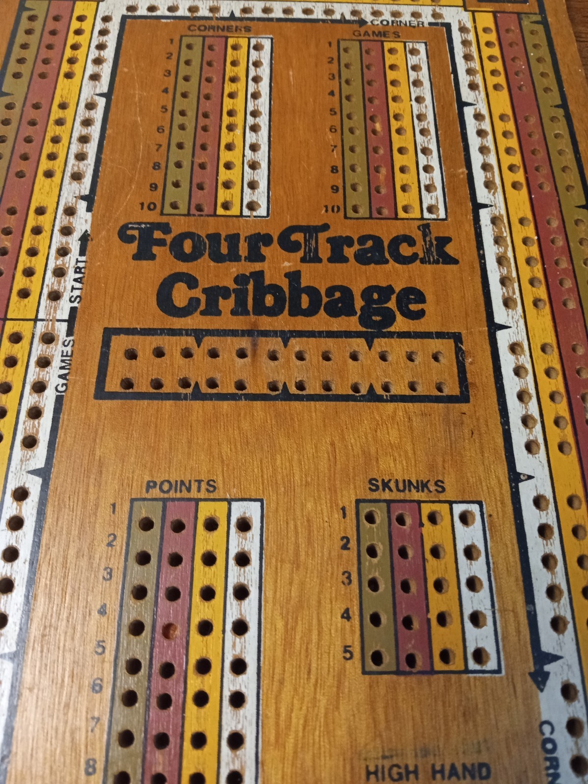 Four Track Cribbage Board With Metal Pegs And Multi Colour Board Collectable.