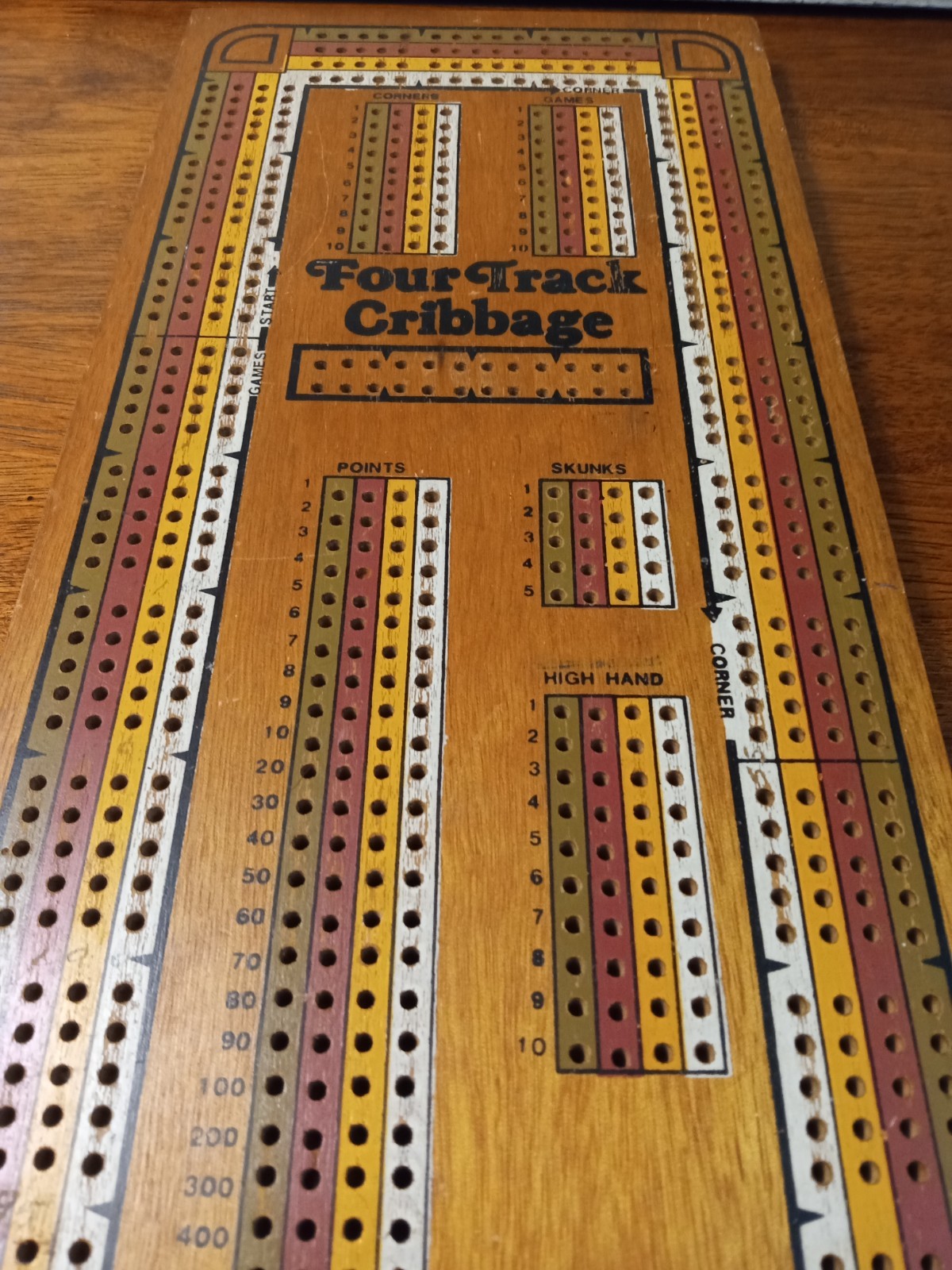Four Track Cribbage Board With Metal Pegs And Multi Colour Board Collectable.