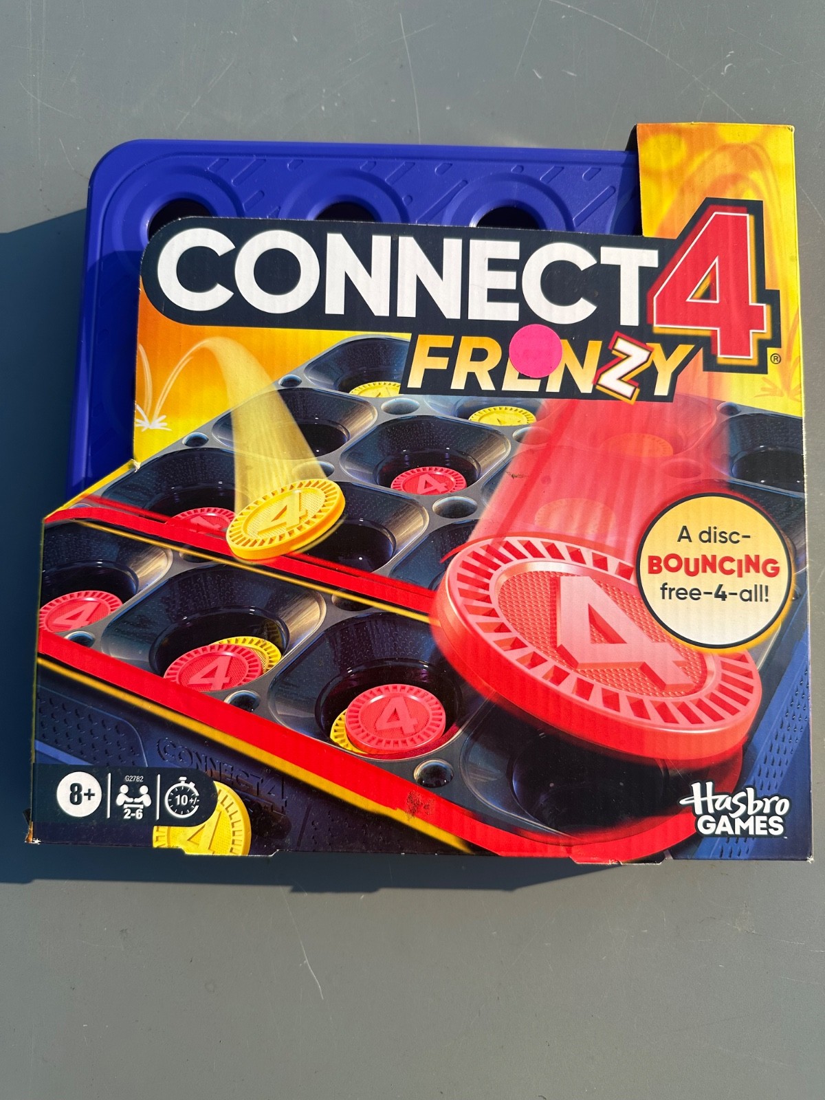 Hasbro Connect 4 Frenzy Board Game, Bouncing Discs, 2-6 Players, Ages 8+