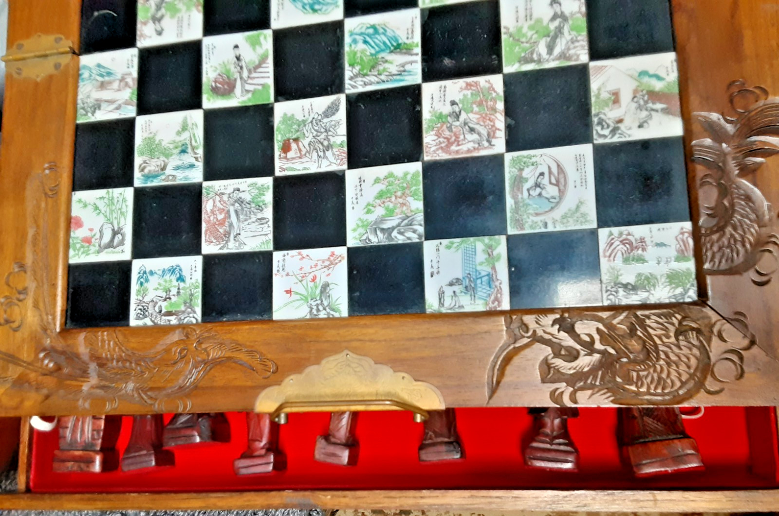 Antique handmade chess set made of natural wood and ceramic