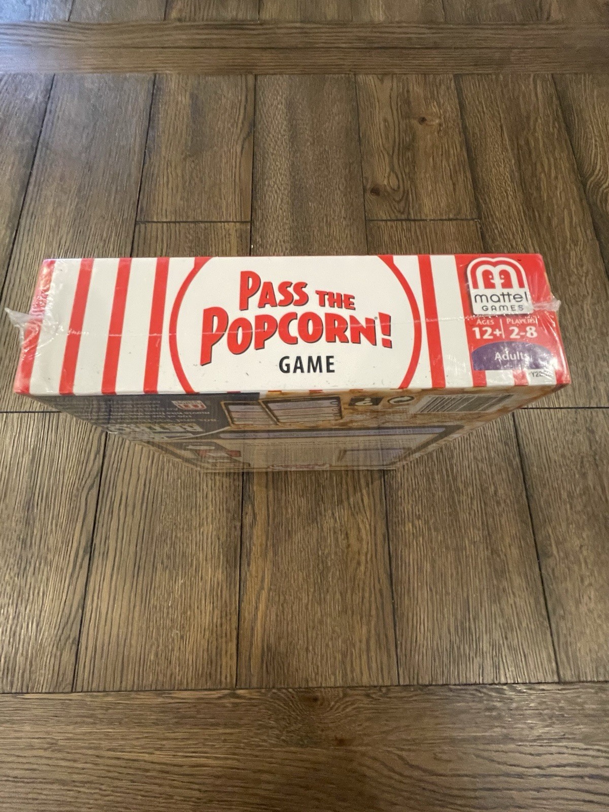Mattel – Pass the Popcorn (Movie Trivia Family Party Game) – New / Sealed