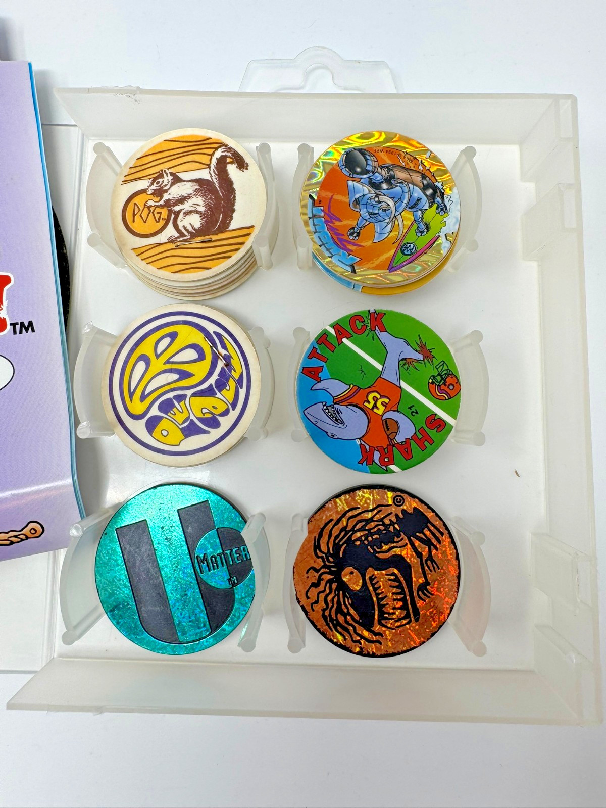 The World POG Federation Micro Tournament Game Pack with 2 Slammers & 25 Pogs