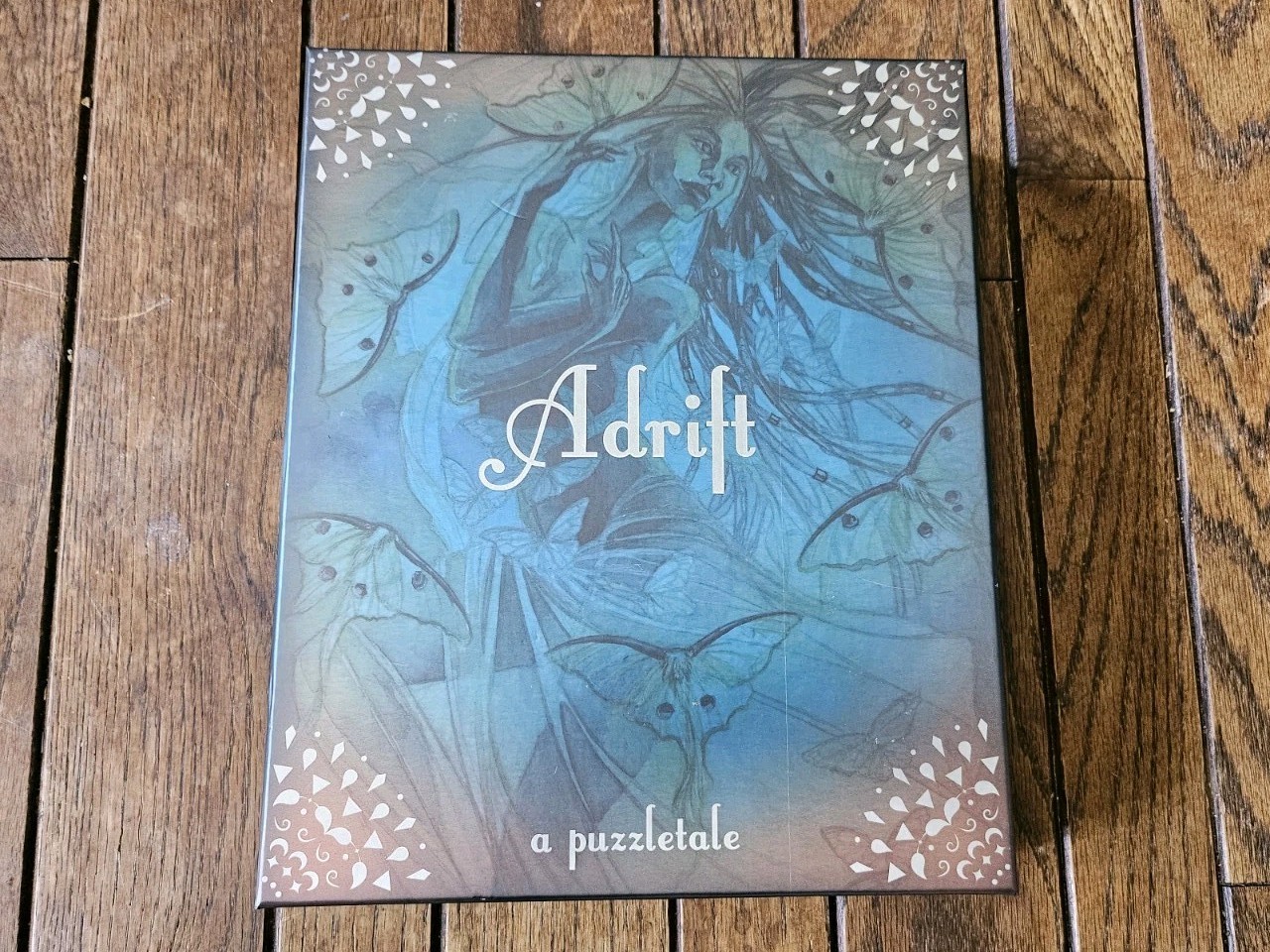 Adrift Puzzle Tale Game. Postcurious. Open Box. Complete.