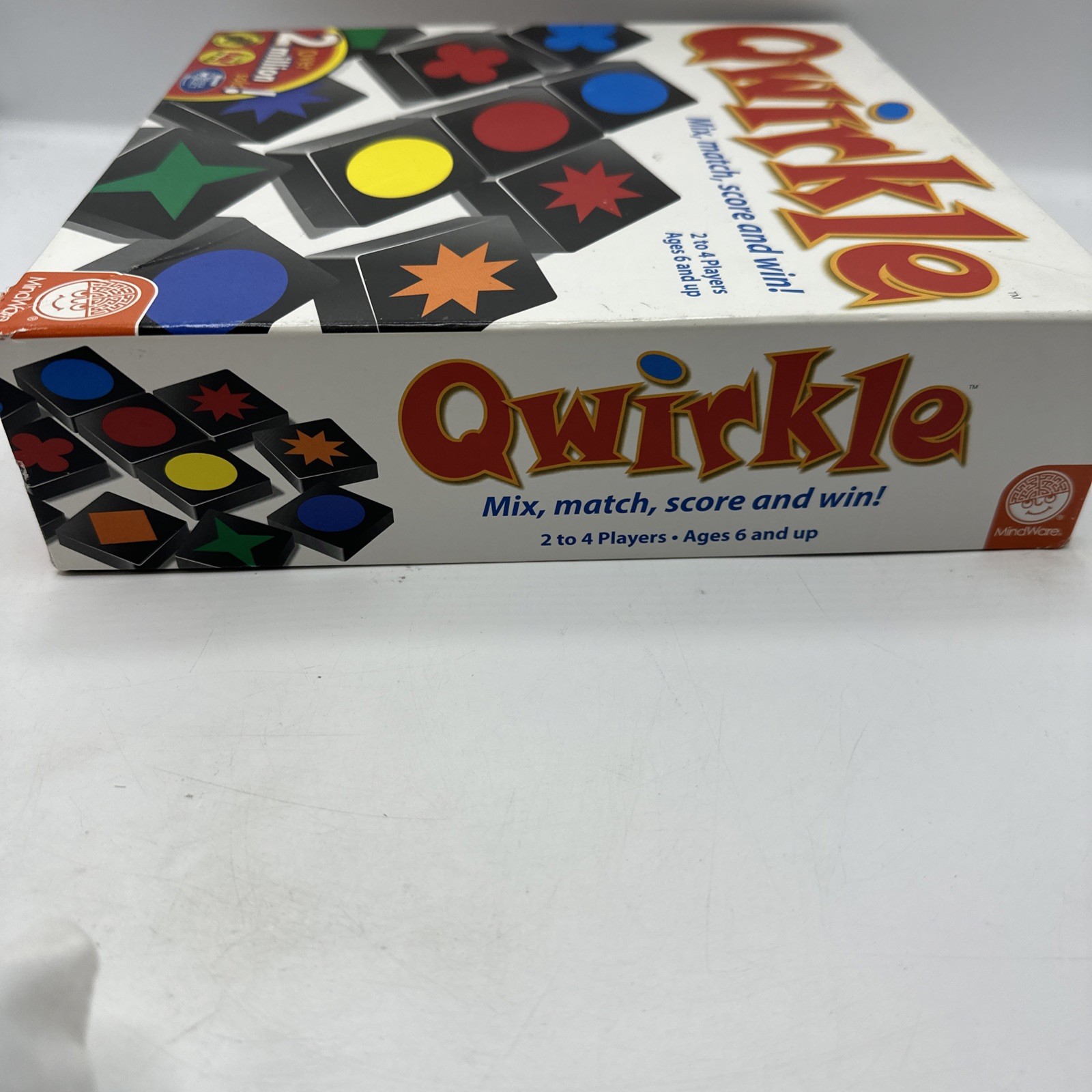 QWIRKLE – Mix, Match, Score and Wiin! 2-4 players, ages 6 and up. Complete 2010