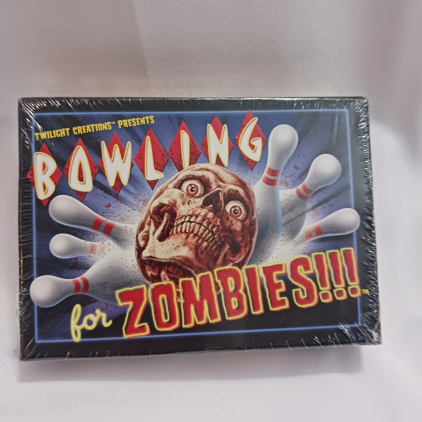 Bowling For Zombies!!! Twilight Creations 2-5 Players. Ages 15+. 15 Minute Play