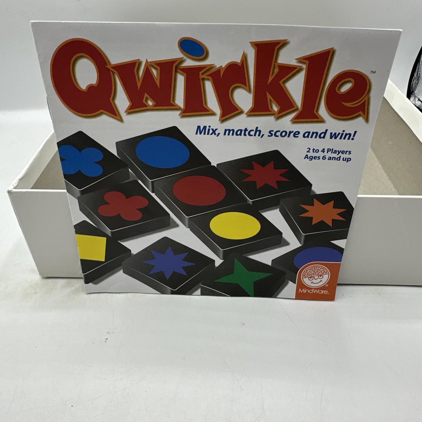 QWIRKLE – Mix, Match, Score and Wiin! 2-4 players, ages 6 and up. Complete 2010