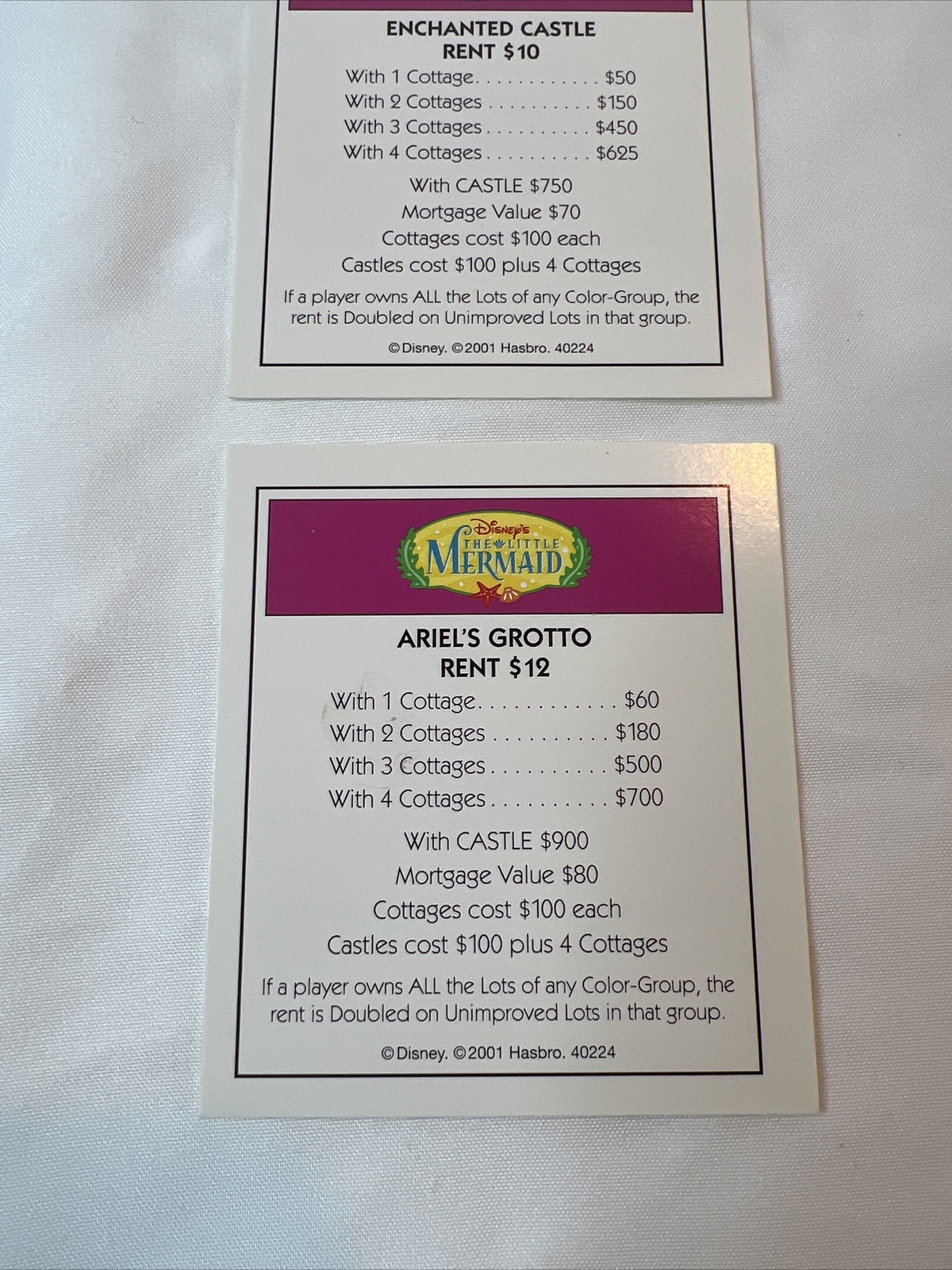 2 Light Purple Properties Monopoly 2001 Disney Edition Parker Brothers Game