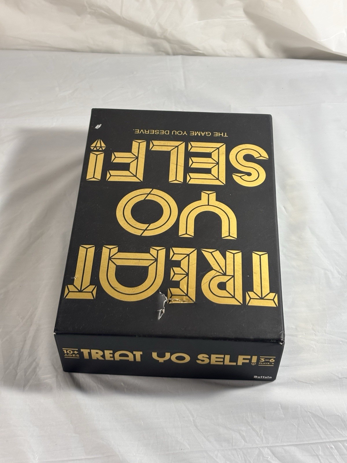 Treat Yo Self! The Game You Deserve. A Bidding and Bluffing Family Strategy Game