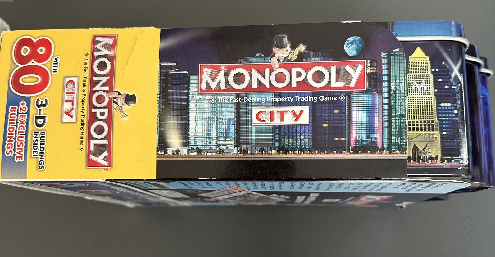 MONOPOLY CITY Metal TIN Box Edition Game 2009 New in Box. Never Played