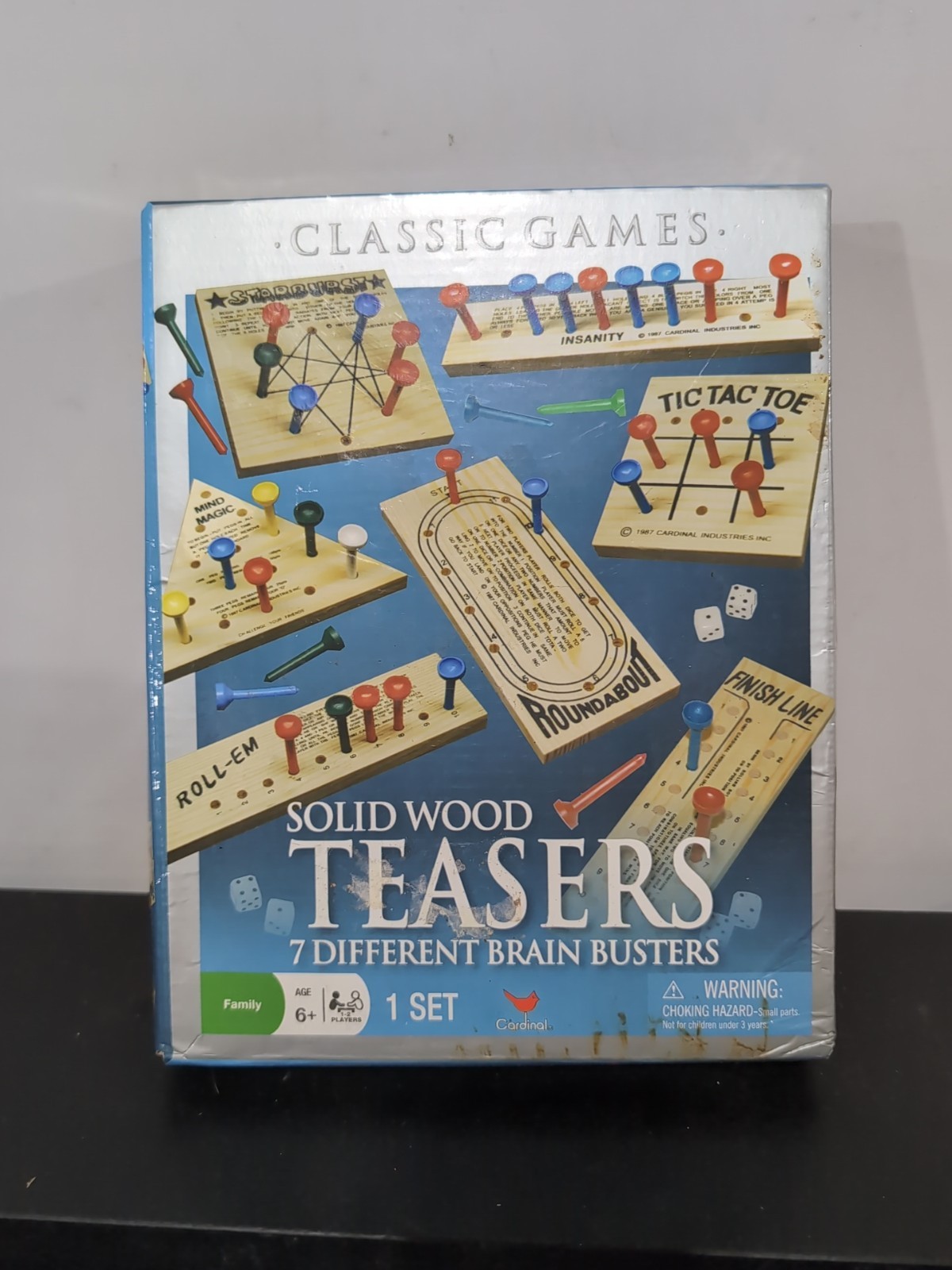 Solid Wood 7 Different Brain Teasers, Brain Busters – Sealed in Open Box