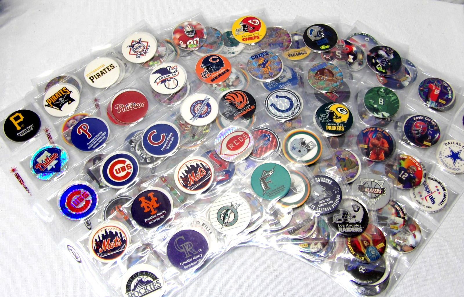Pogs!• Sports Themed!• 280 Wrapped/Sleeved Pogs!• NFL• NBA• MLB• NHL• FIFA•