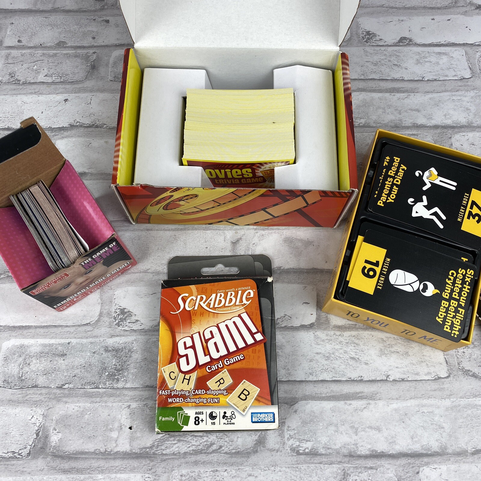 4 Family Boxed Card Games Game of Meme Movies Trivia Scrabble Slam