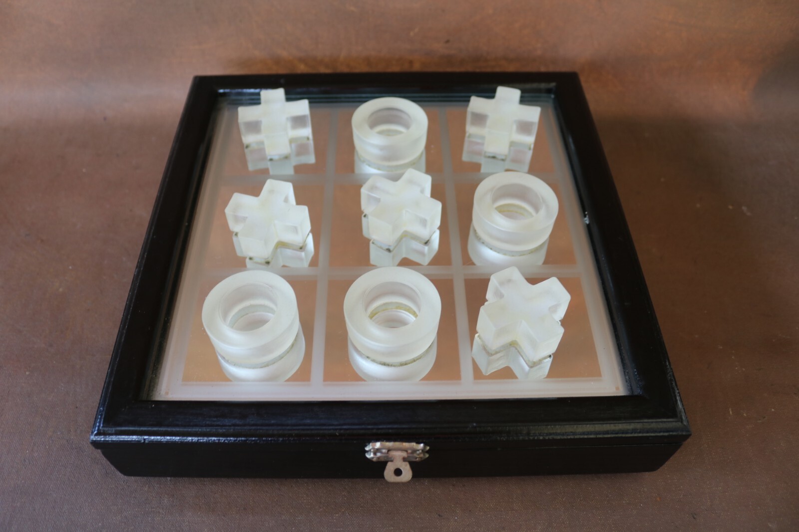 Tic-Tac-Toe Board Game featuring acrylic tokens with a storage mirrored board