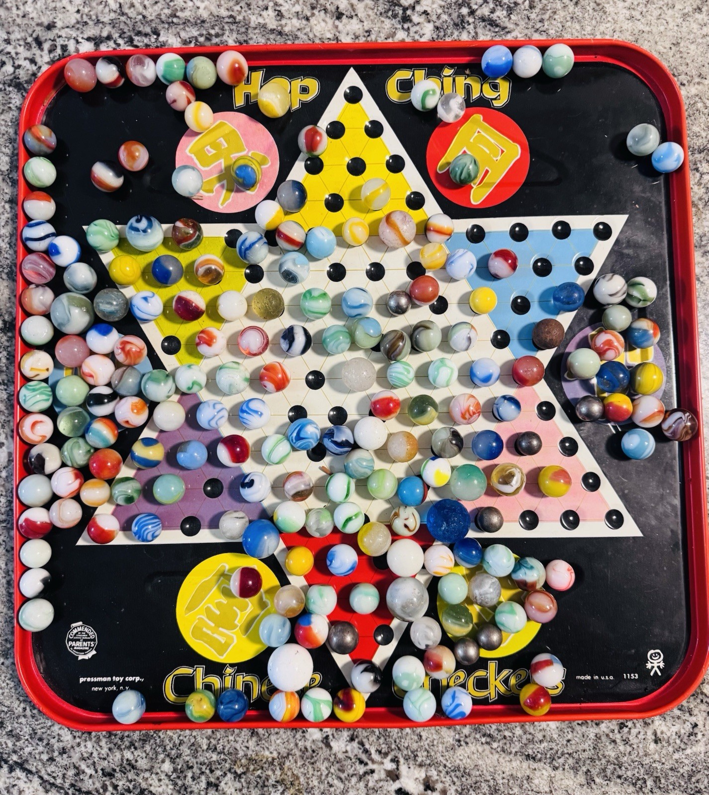 VINTAGE MARBLES from 50’s and 60’s and Chinese checker board with some pieces