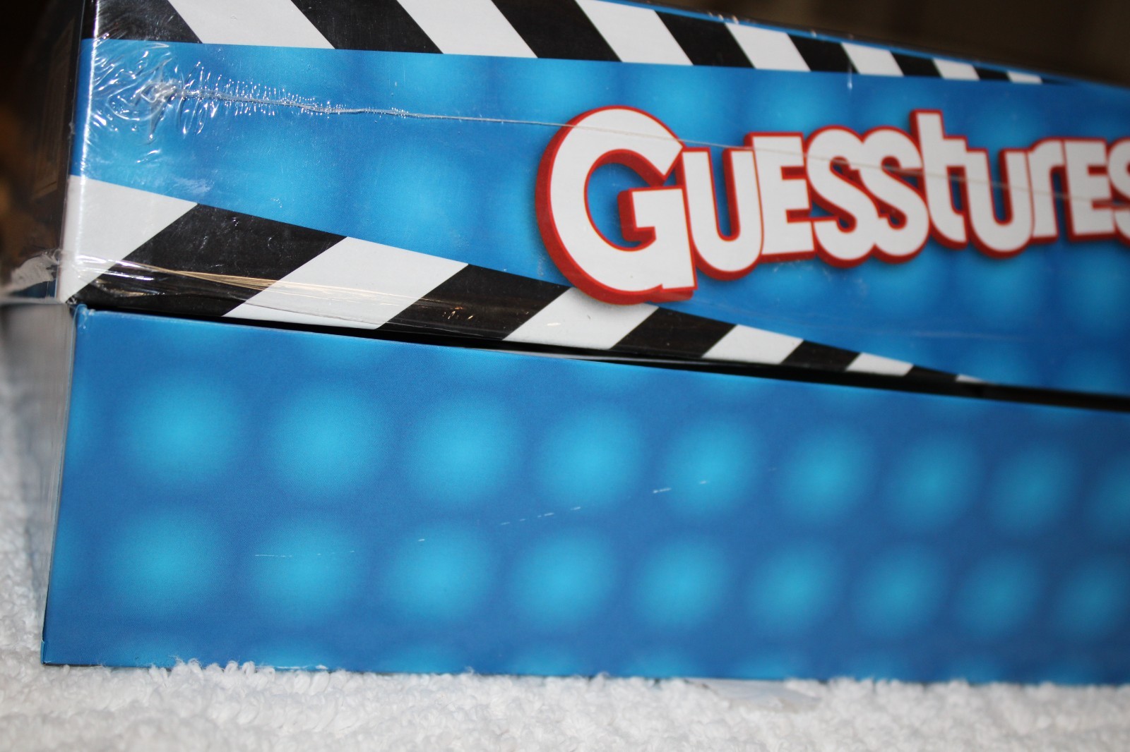 Hasbro Gaming Guesstures Game Charades Game for 4 or More Players Family Party