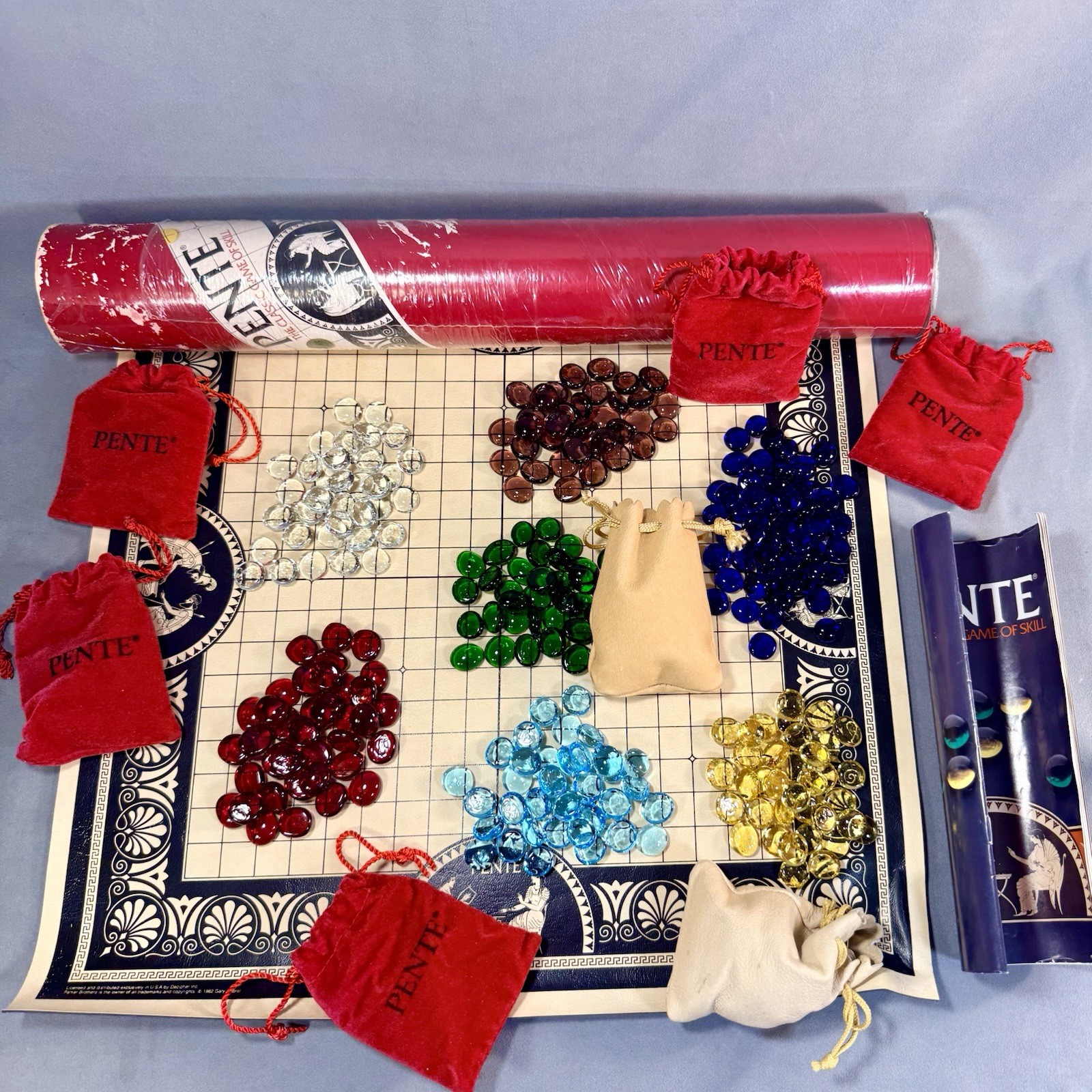 1987 Vintage Red Tube PENTE Game Yellow Green Purple Red Cobalt Blue Clear Stone