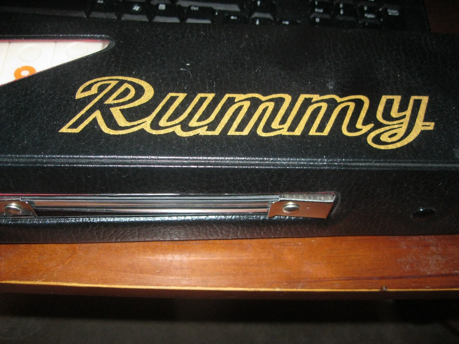 NEW RUMMY GAME.NEVER USED AND IN LEATHER CASE.
