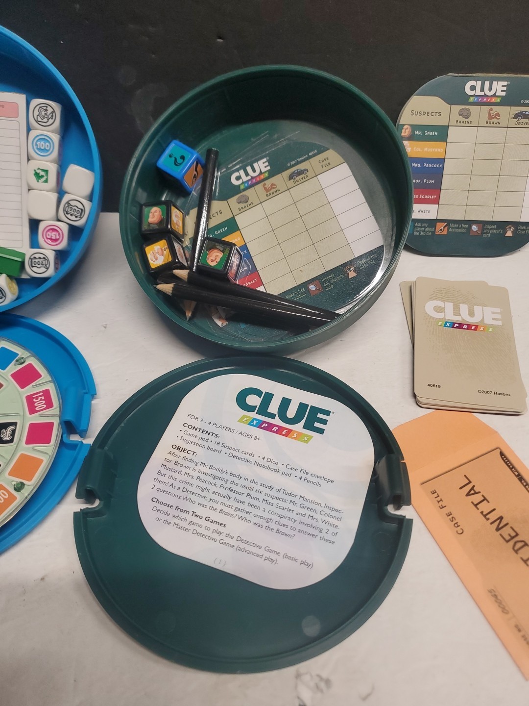 (2) EXPRESS Games: TRAVEL Monopoly & Clue OPEN BOX