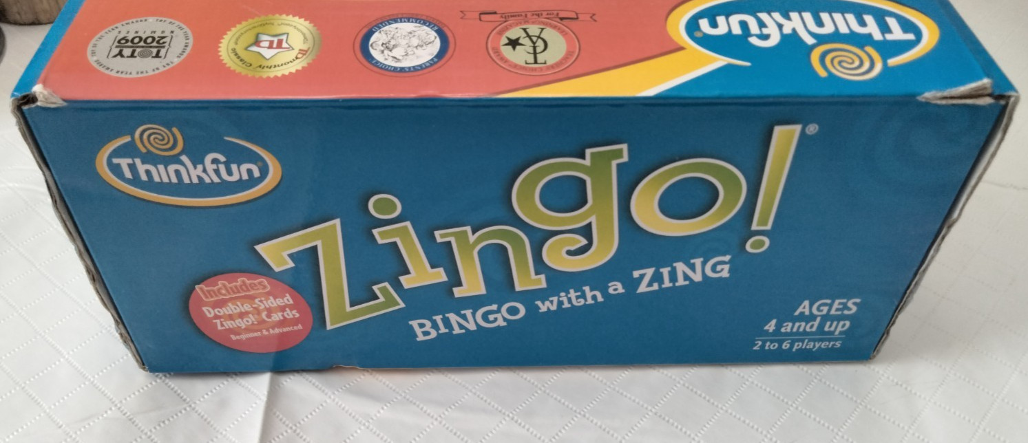 Zingo! Bingo with a Zing Thinkfun ages 4+ 2-6 plyrs ’09 complete box has damage