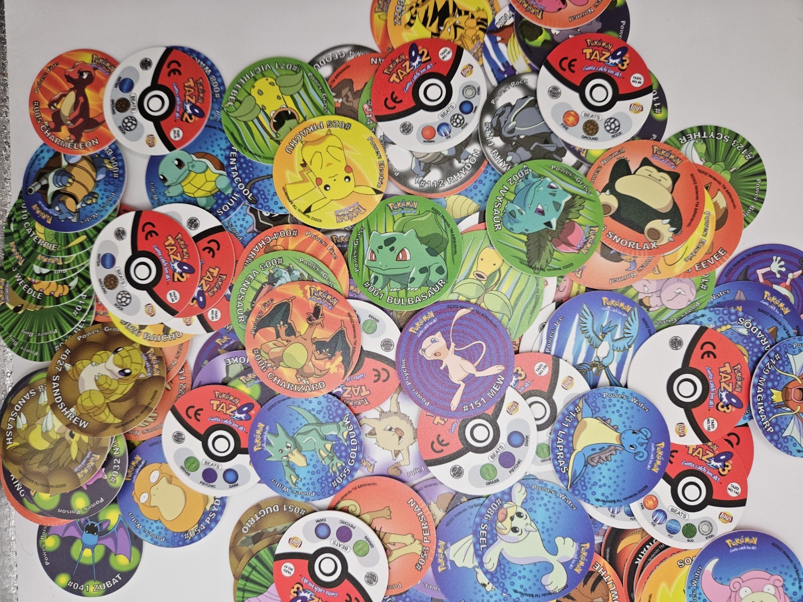 Lot of 500 Random Mix Of 2002 Pokemon Tazos From 1st Generation Pokemon Tazos